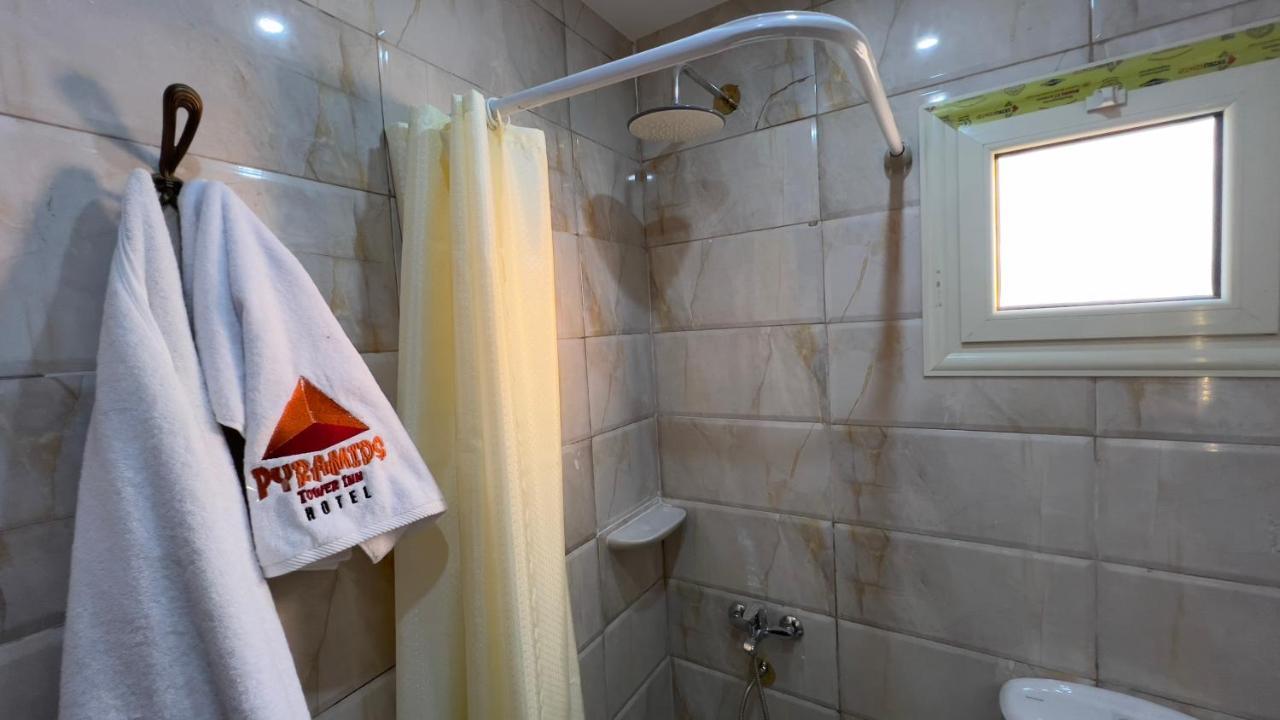 Pyramids Tower View Inn Nazlet el Simman ภายนอก รูปภาพ