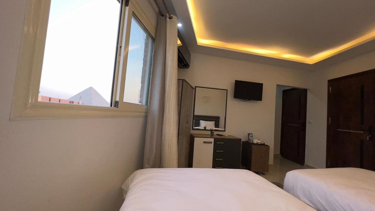 Pyramids Tower View Inn Nazlet el Simman ภายนอก รูปภาพ
