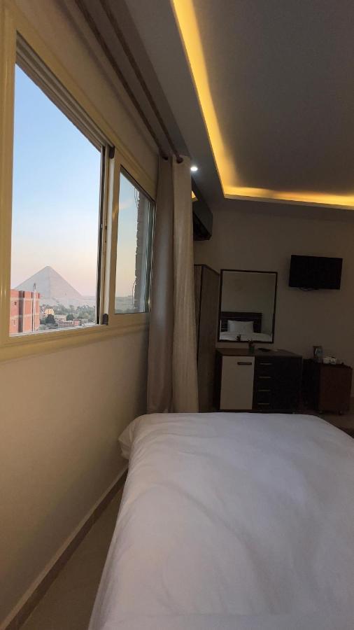 Pyramids Tower View Inn Nazlet el Simman ภายนอก รูปภาพ